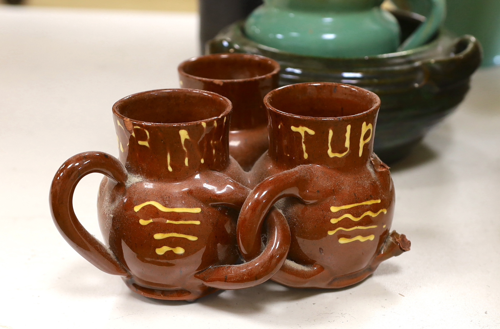 A large collection of assorted glazed Dickerware vases, jugs and pots